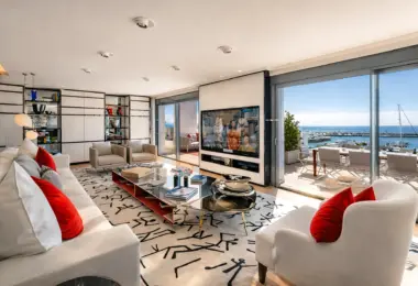 Apartment for sale Marbella Spain – Puerto Banús luxury living room with panoramic marina view and large terrace