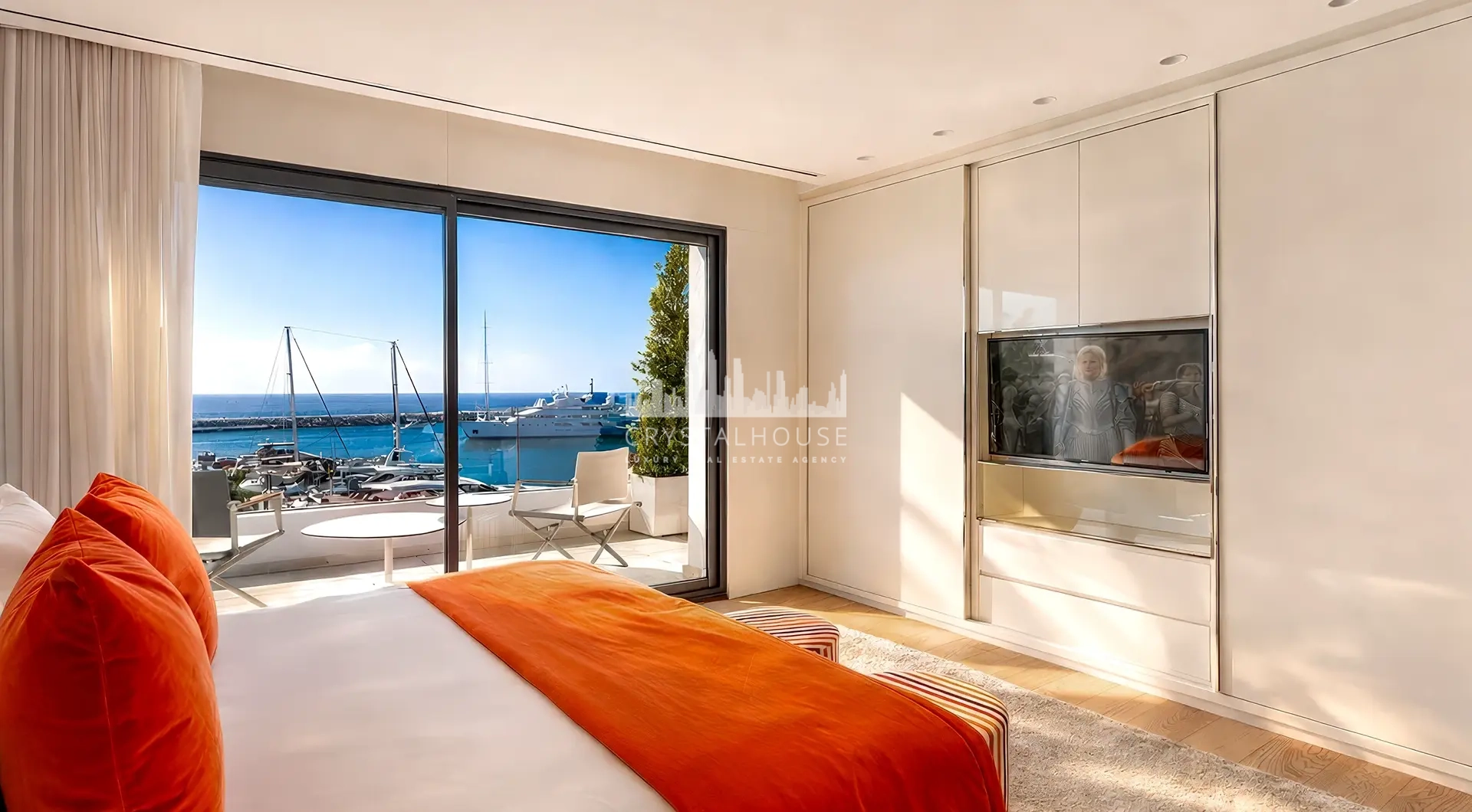 Apartment for sale Marbella Spain – Puerto Banús luxury bedroom with marina view terrace and Mediterranean sea panorama