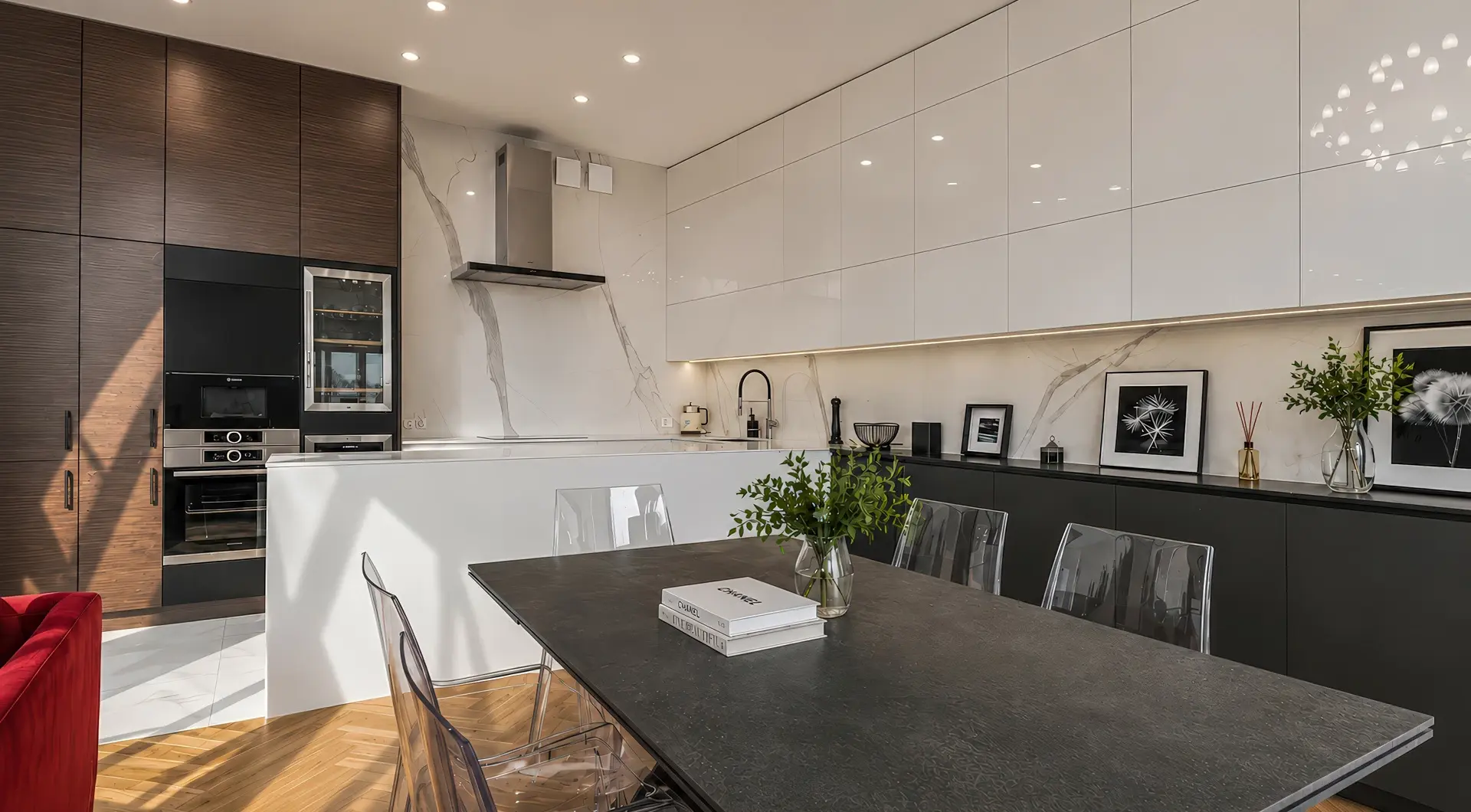 Luksusowy apartament w Krakowie – elegancka jadalnia z dużym stołem i nowoczesną otwartą kuchnią