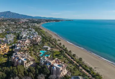 Luxury beachfront apartment in Estepona seaside residential complex with pool and sandy beach